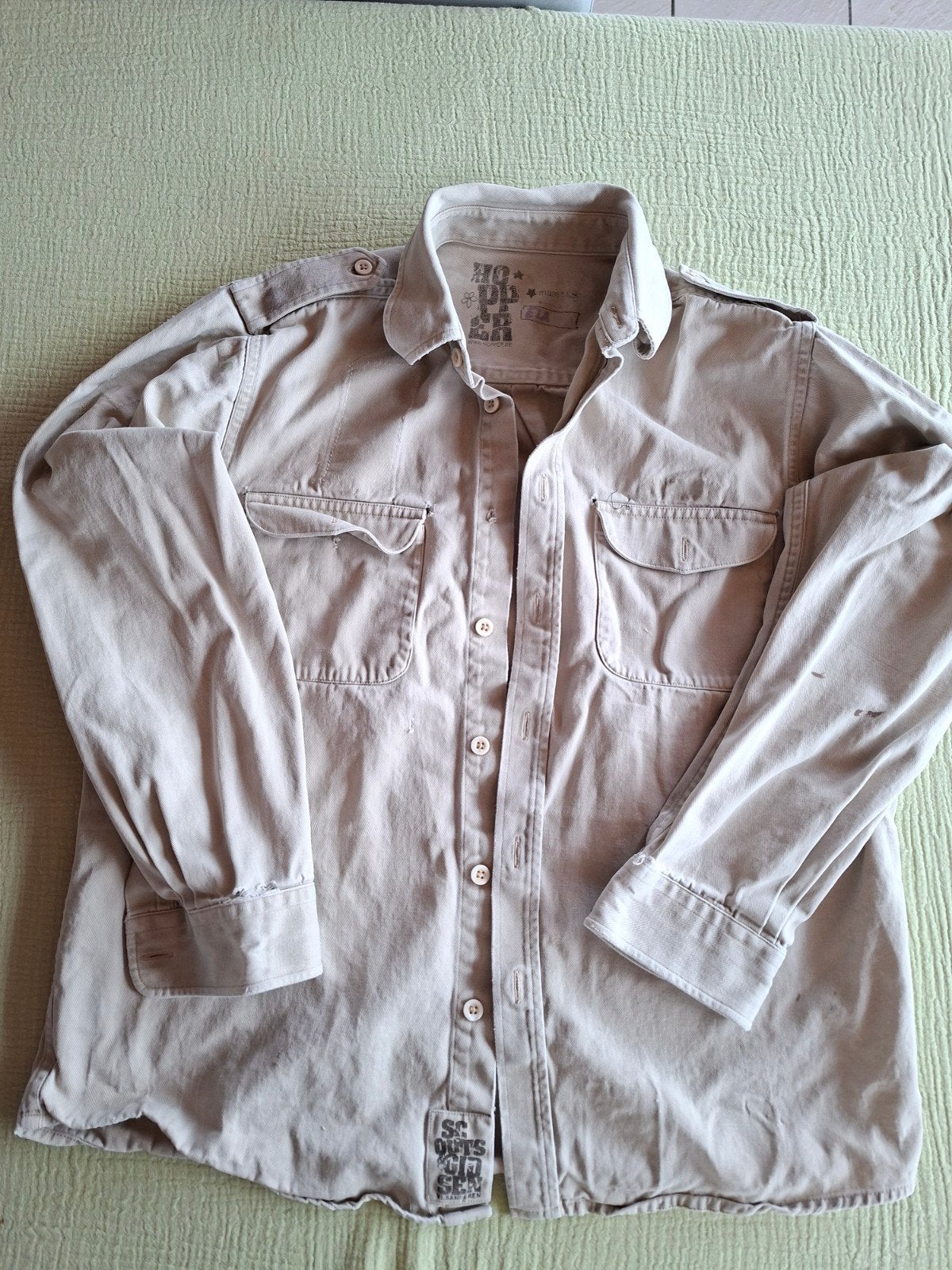 Scoutshemd maat 14, Ophalen