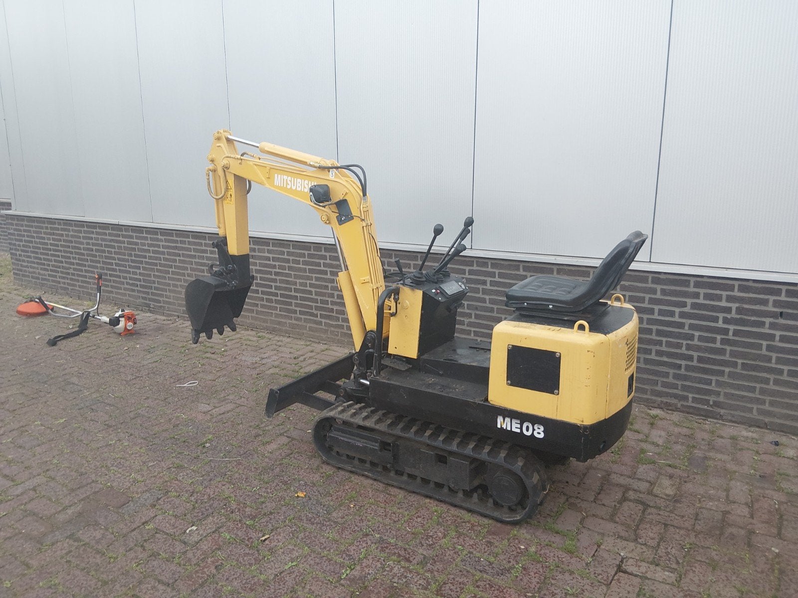 Mitsubitsi minigraver, Ophalen, Graafmachine