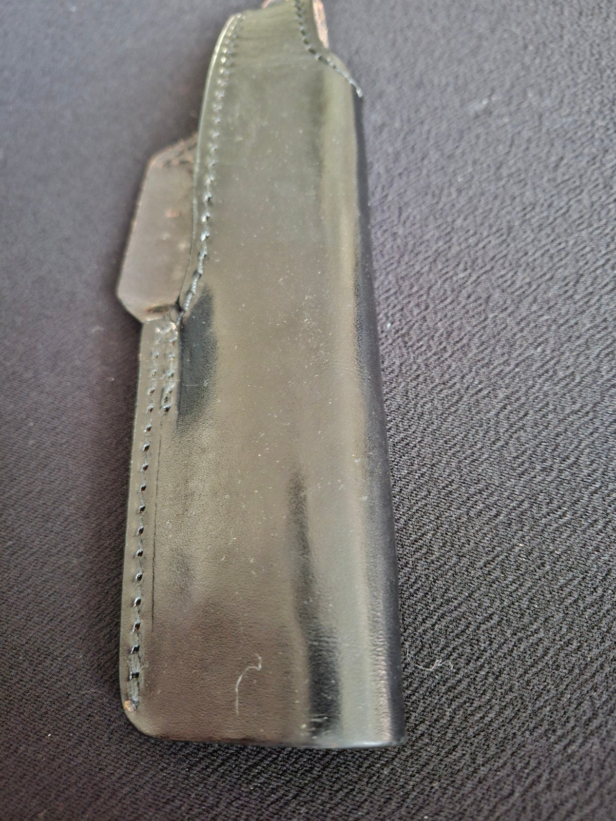 Étui en cuir pour pistolet, Enlèvement