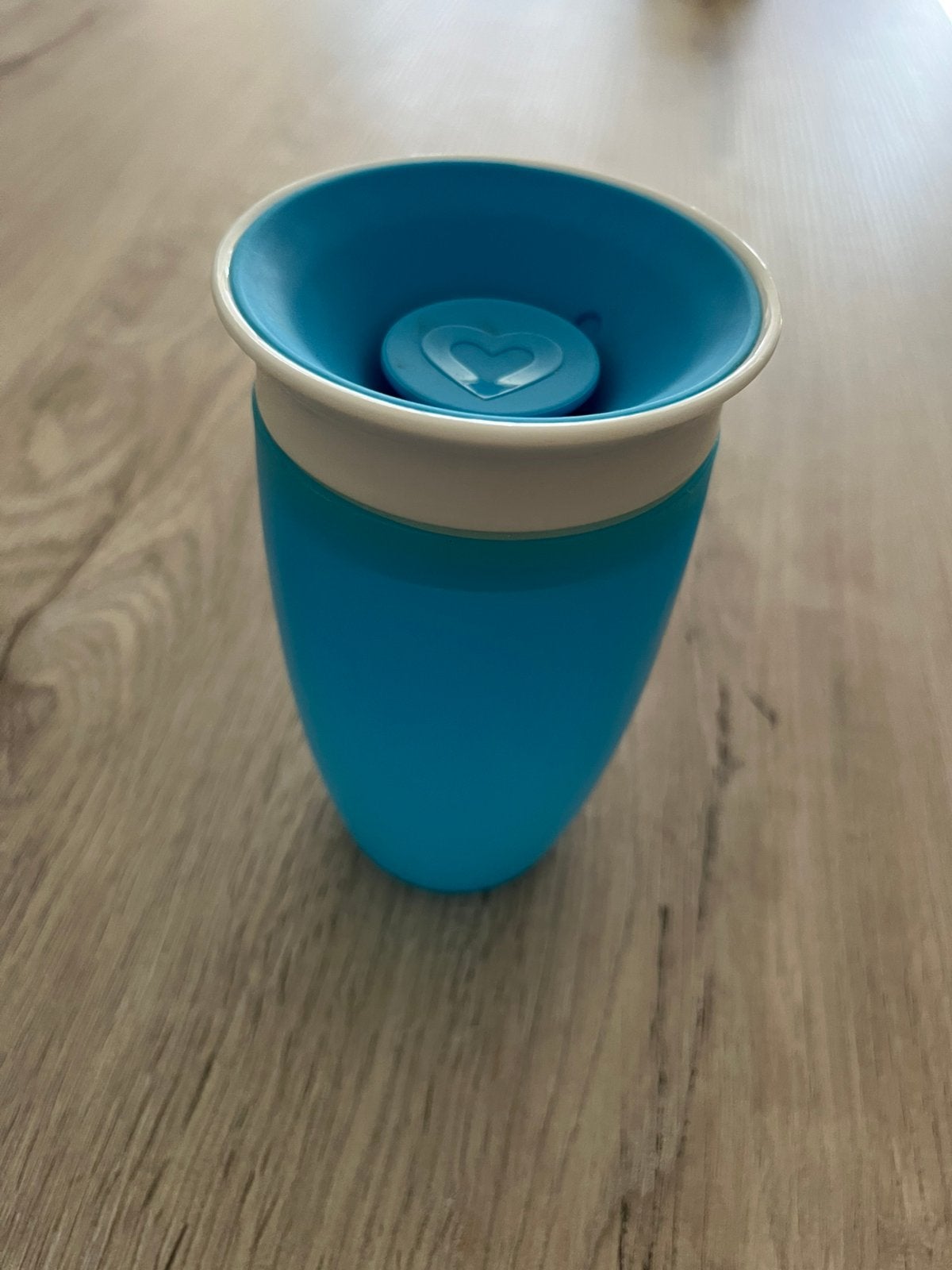 Munchkin drinkbeker, Ophalen