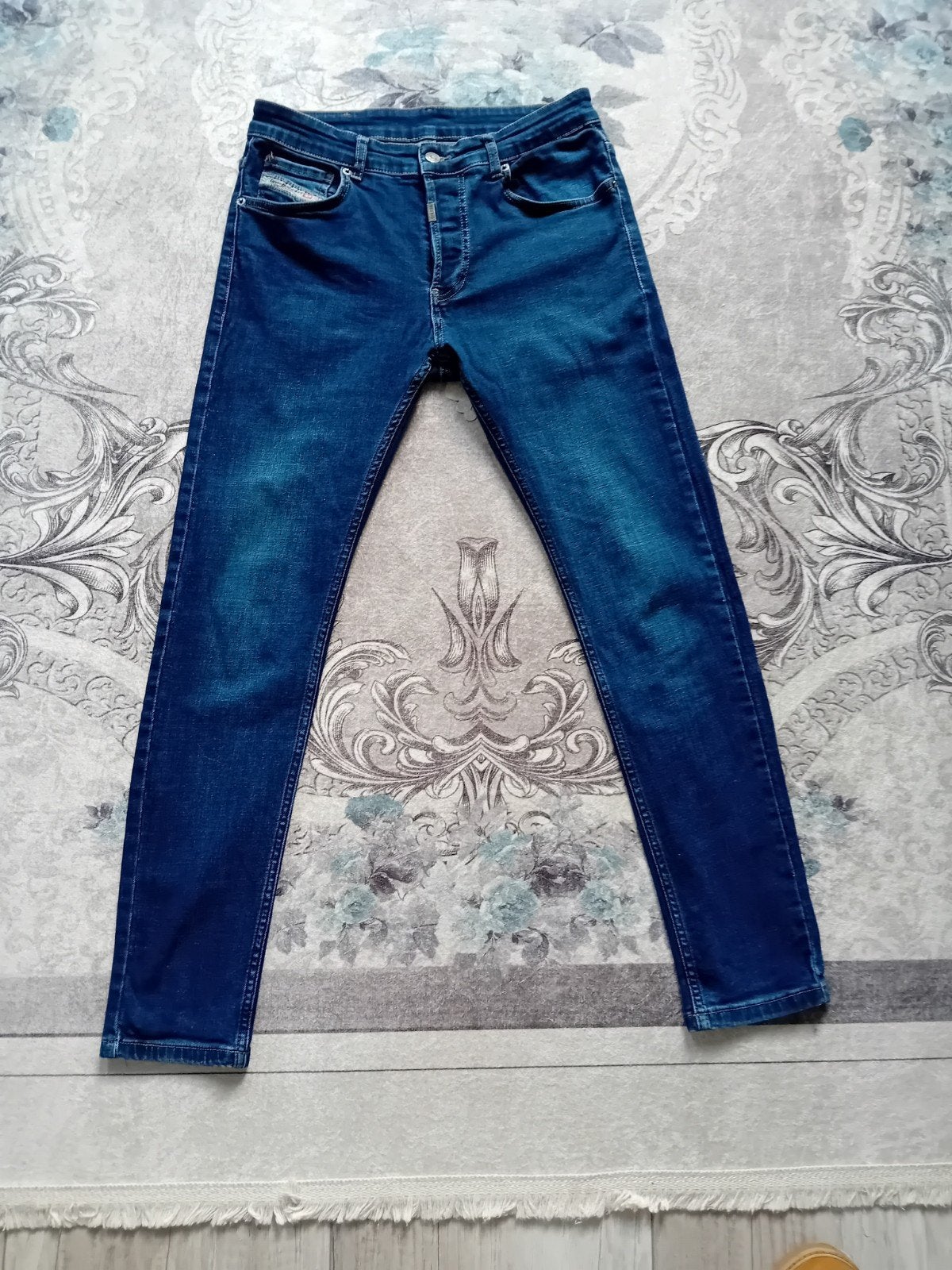 Jeans skinny et slim bleus (Diesel), Enlèvement