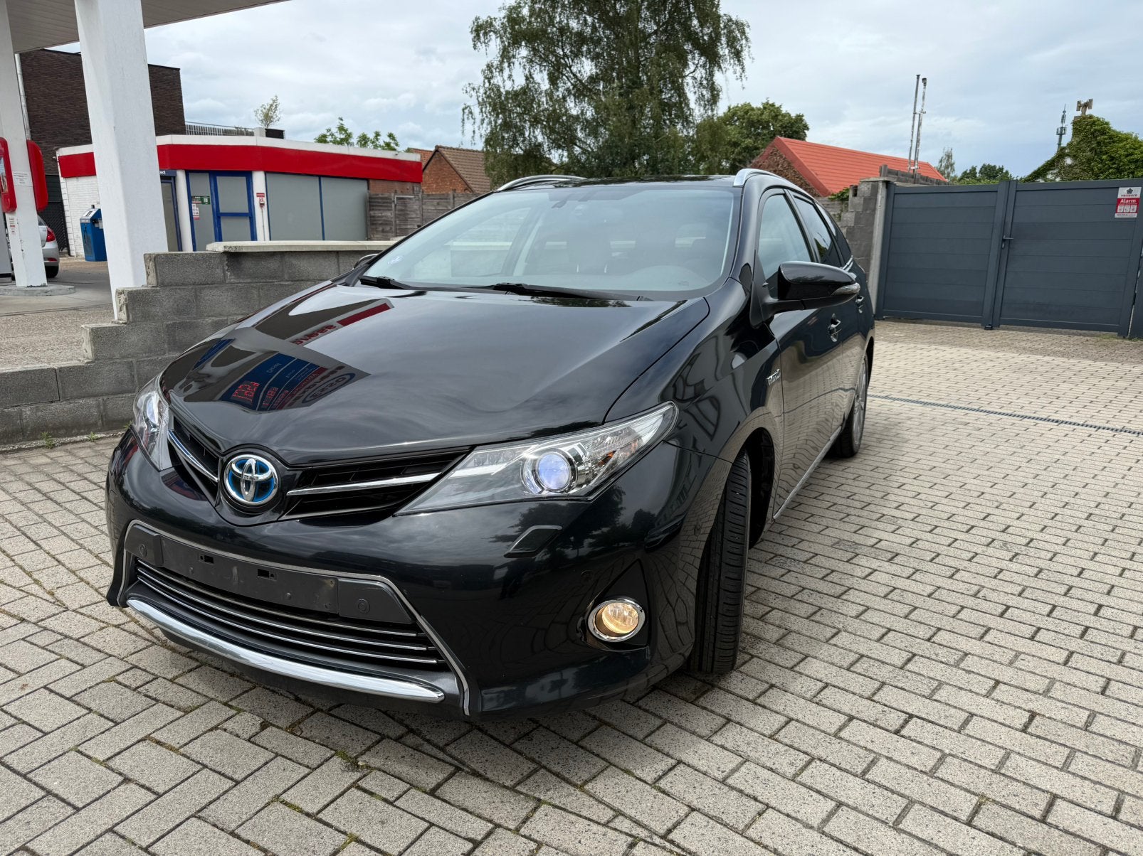 Toyota Auris 1.8 HYBRIDE voll voll. JBL, Zwart, 4 cilinders, Leder en Stof, Zwart