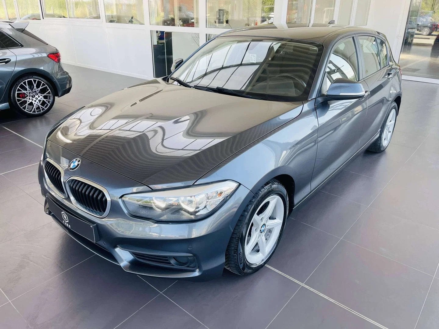 BMW 1 Serie 118 iA * GARANTIE + GPS + AIRCO * (bj 2019), Auto's, BMW, Gebruikt, Euro 6, 1885 kg, 136 pk