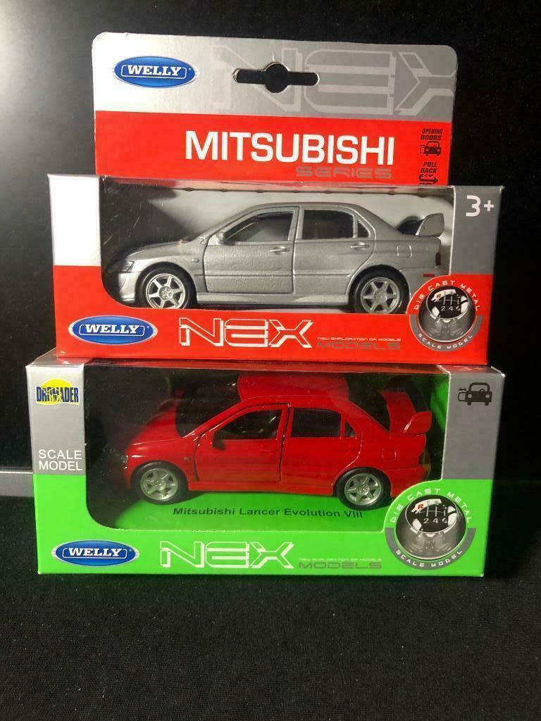 WELLY 2x Mitsubishi Series Lancer Evolution VIII, Hobby en Vrije tijd, Modelauto's | Overige schalen, Nieuw, Auto, Ophalen of Verzenden