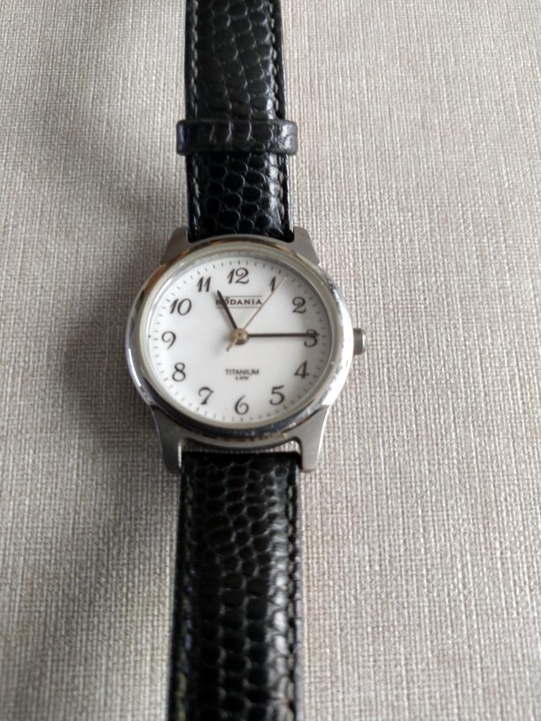 Montre rodania titanium 3ATM, Bijoux, Sacs & Beauté, Montre-bracelet, Autres marques, Enlèvement ou Envoi, Cuir