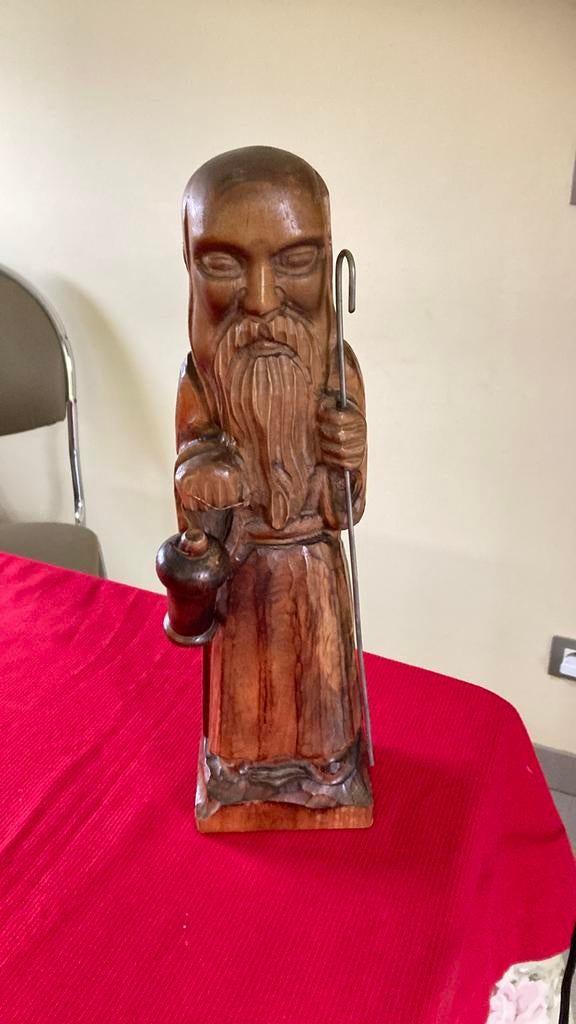 Pater boni in hout snijwerk, Ophalen