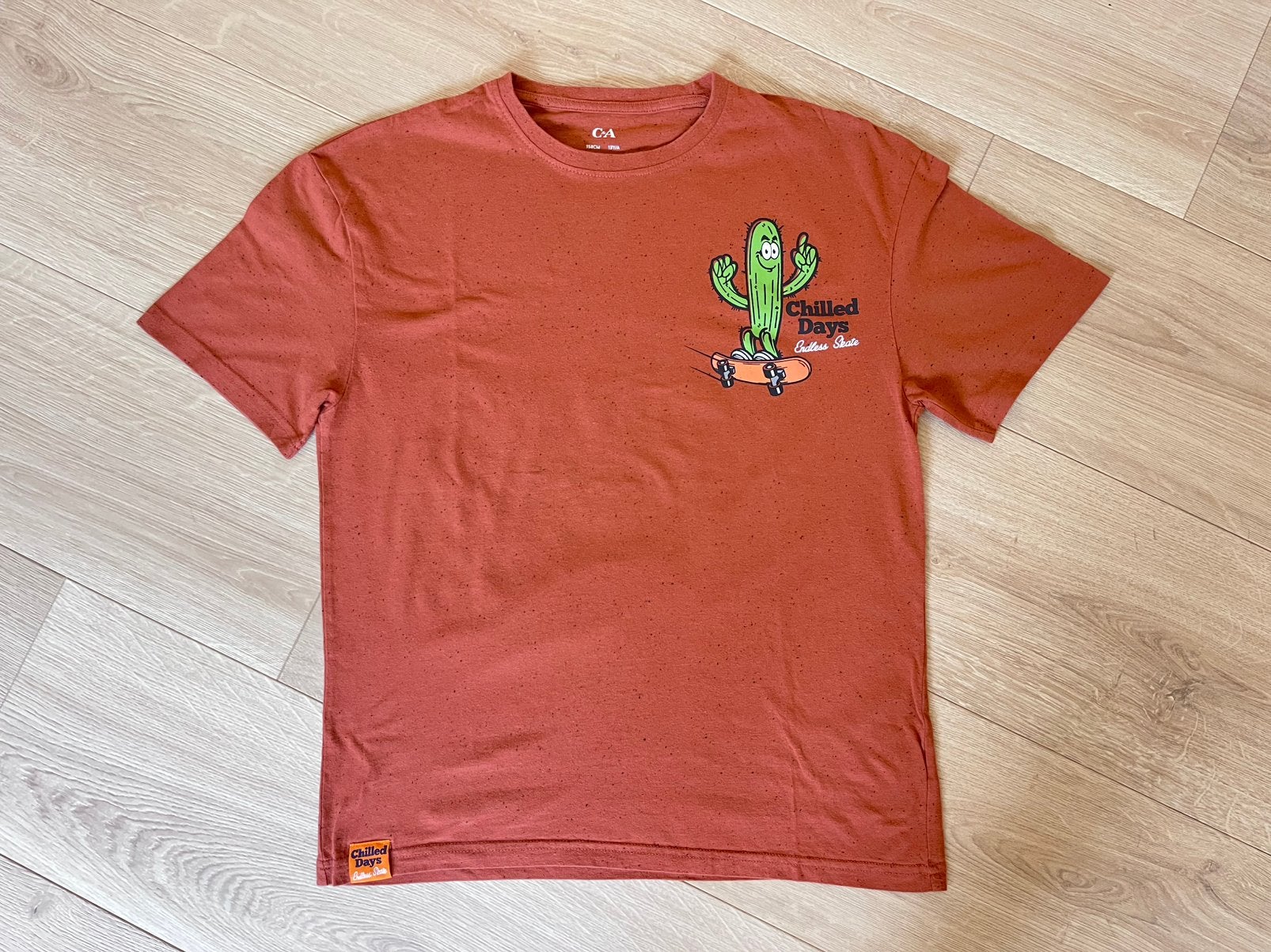Roestbruine t-shirt C&A maat 13 jaar, Ophalen of Verzenden, Zo goed als nieuw, Jongen of Meisje, Shirt of Longsleeve