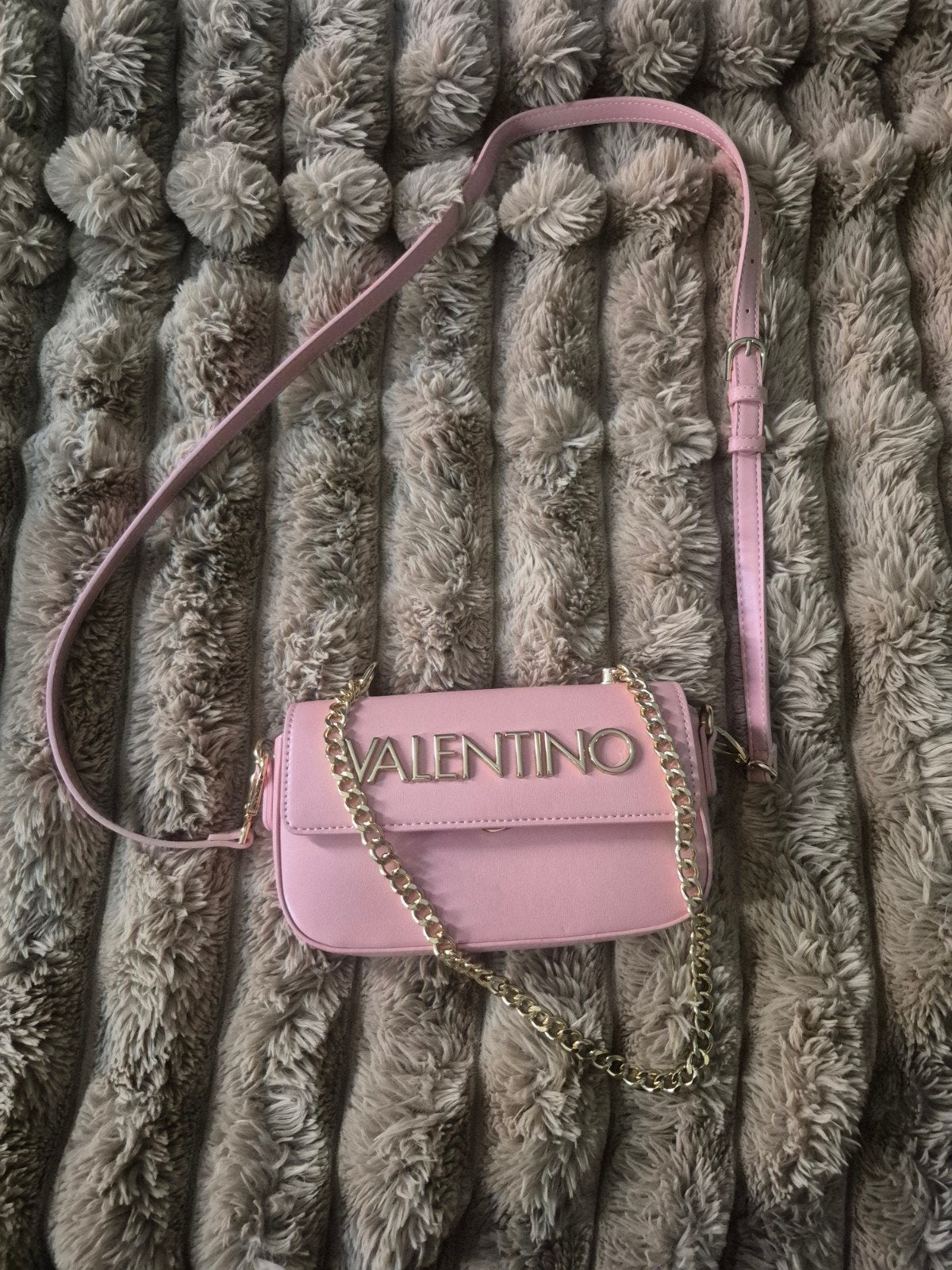 tasje valentino, Ophalen