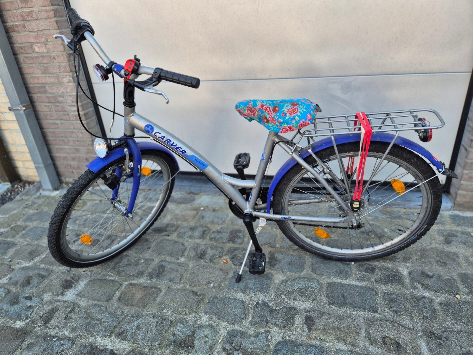 blauw grijze meisjesfiets, Ophalen