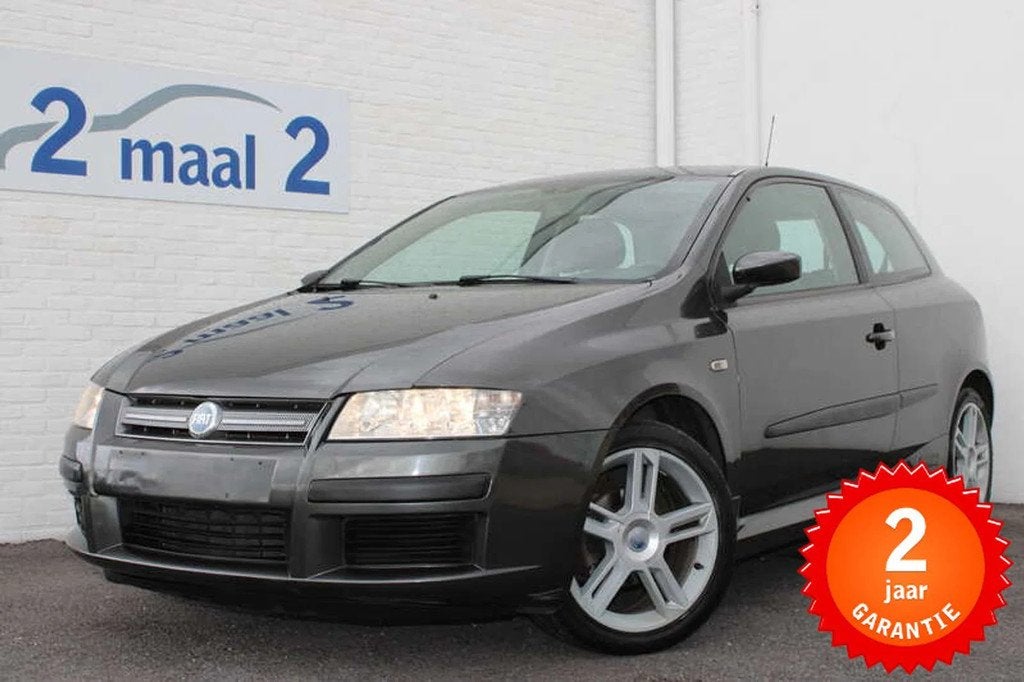 Fiat Stilo 1.4i 16v Racing inclusief 2 JAAR garantie!, Auto's, Fiat, Gebruikt, Zwart, 95 pk, Parkeersensor