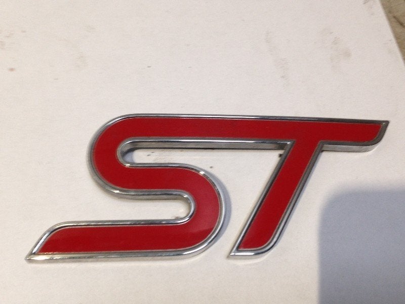 LOGO / EMBLEME Ford Focus 3 ST (f1eb-42528-aa), Henry-Ford-Straße  1
50735  Köln, DE, Ford-Werke GmbH, Kunden@ford.com, Ford