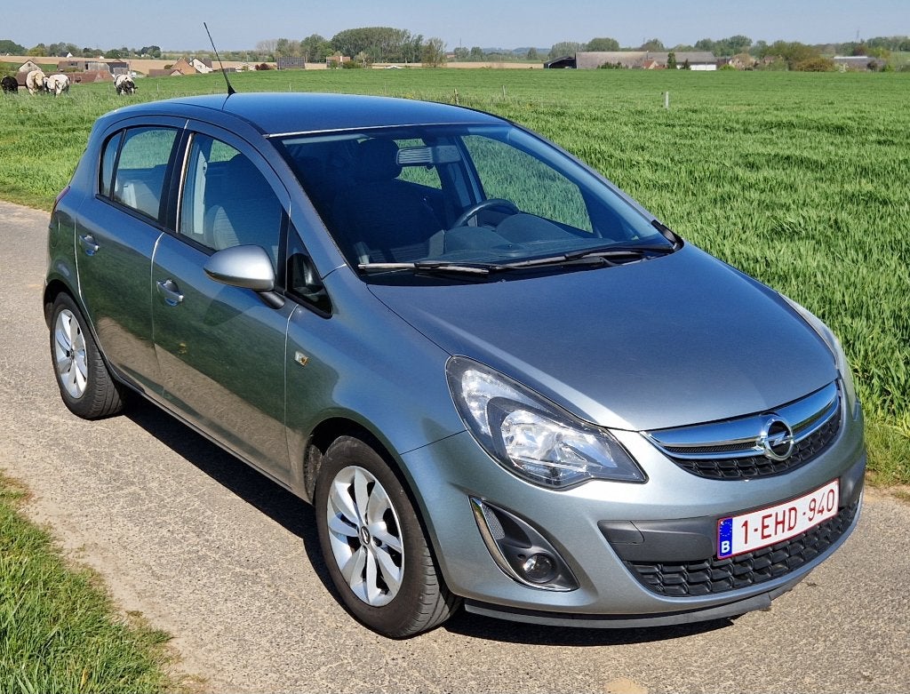 Opel Corsa 1.2i Enjoy, Auto's, Euro 5, 4 cilinders, Particulier, Corsa