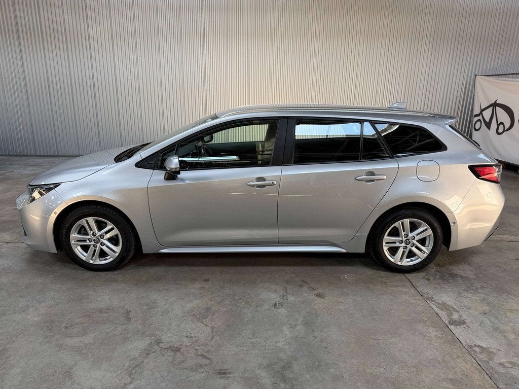 Toyota Corolla Corolla SW Hybrid 1.8 Dynamic Navi Camera Car, Auto's, Stof, Gebruikt, 4 cilinders, 72 kW