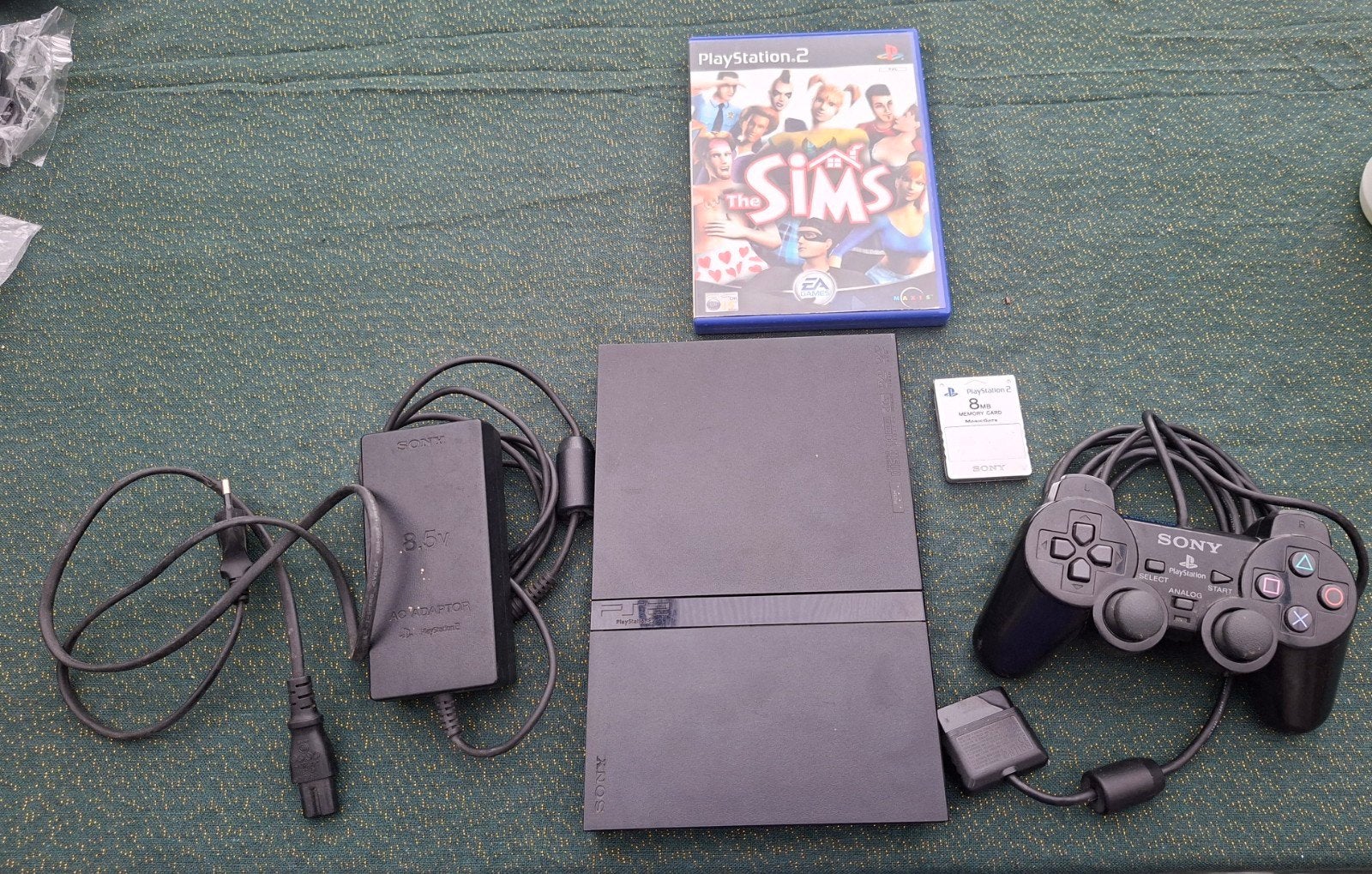 Sony PlayStation 2 Slim, Zwart, Met games, Ophalen of Verzenden, Zo goed als nieuw