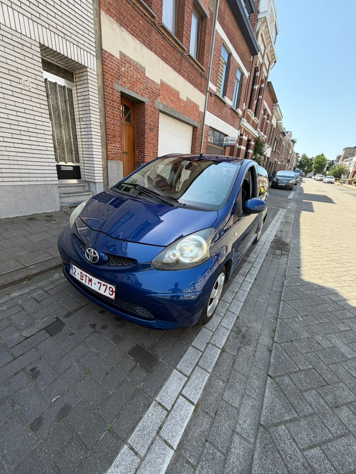 Toyota Aygo 1.0 Benzine | 97.065km | Keuring Verkoop, Auto's, Blauw, Trekhaak, Handgeschakeld, 5 deurs