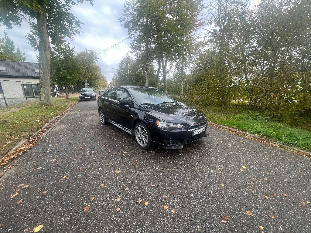 Mitsubishi Lancer te koop, Stof, Zwart, 4 cilinders, Zwart