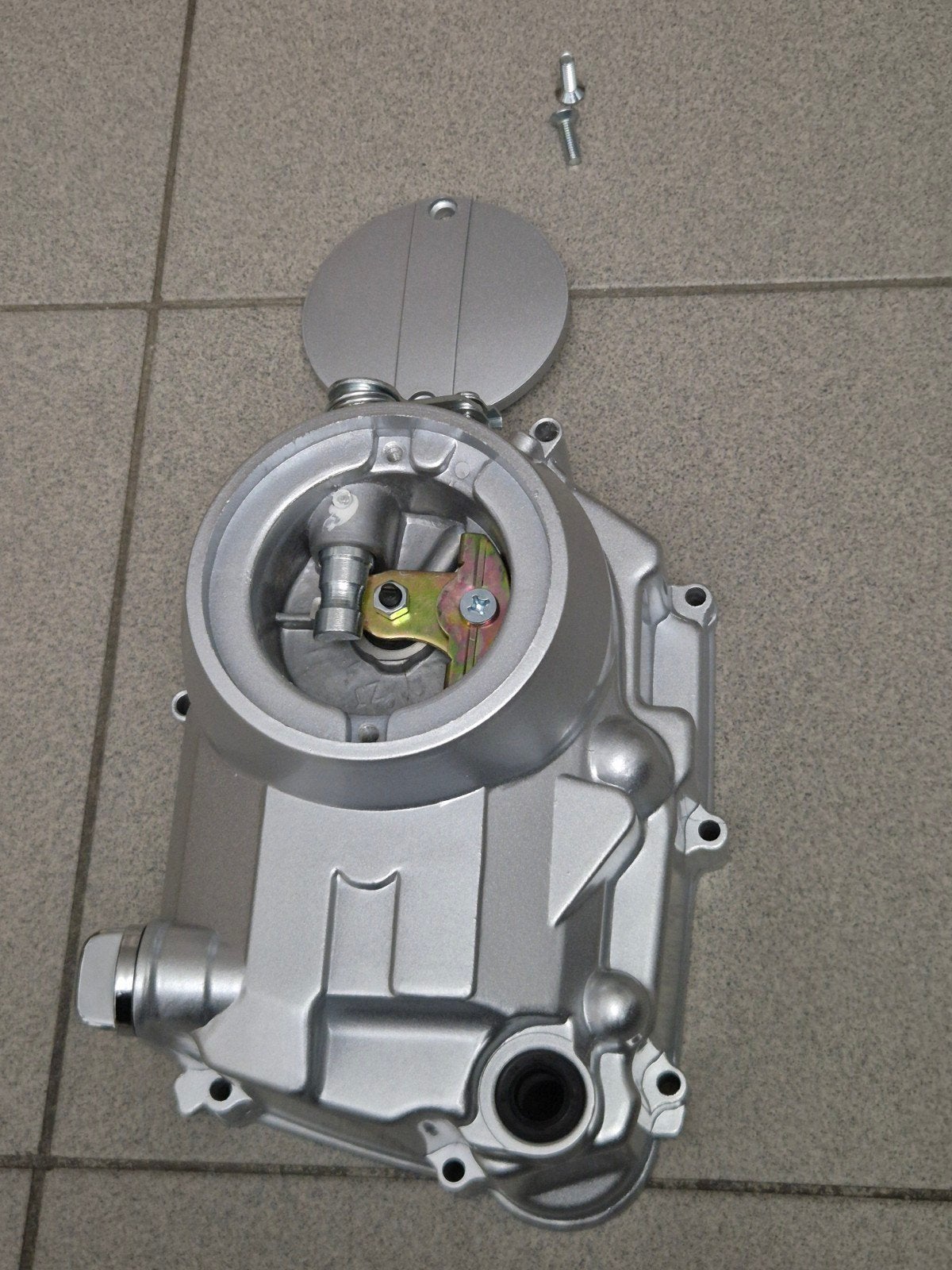 Koppelingsdeksel 125cc, Ophalen