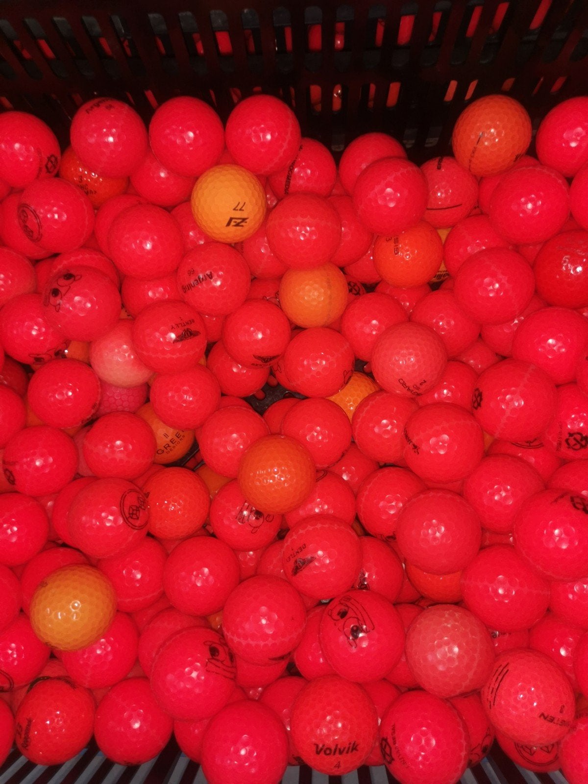 Oranje/rode golfballen 100 stuks, Ophalen of Verzenden