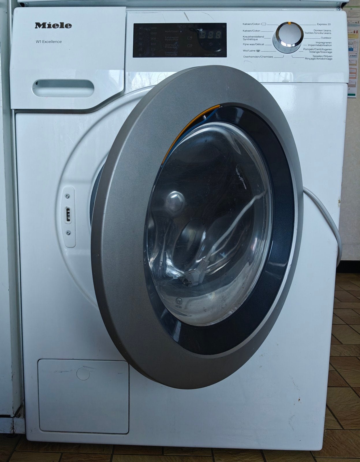 Wasmachine Miele, Ophalen