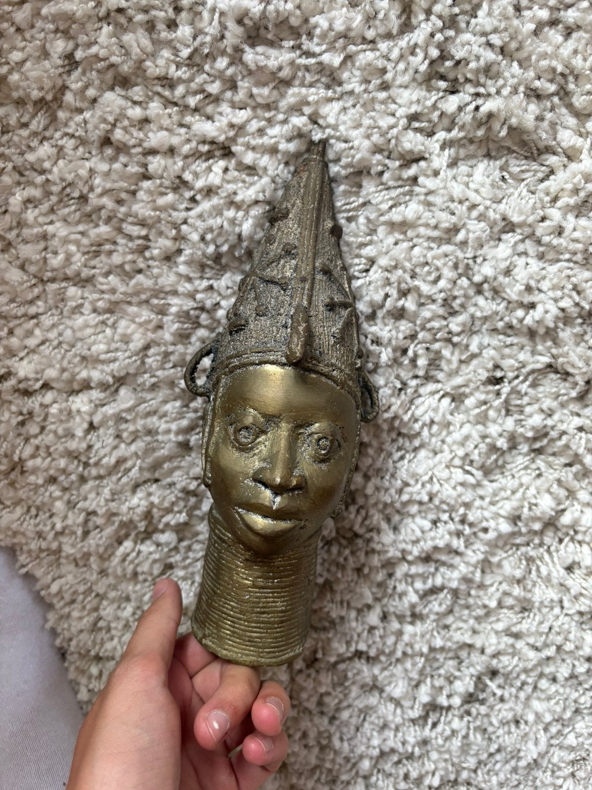 Bronzen beeldje, Ophalen