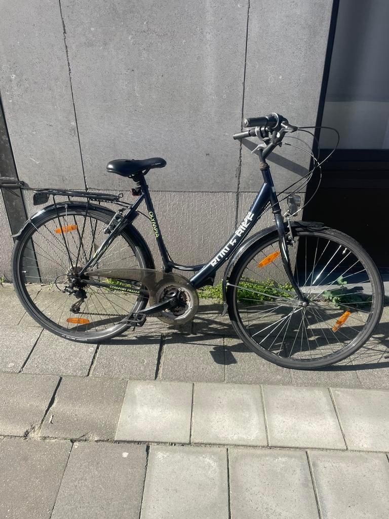 Olympia vrouwen fiets met slot, Fietsen en Brommers, Fietsen | Dames | Damesfietsen, Ophalen, Zo goed als nieuw