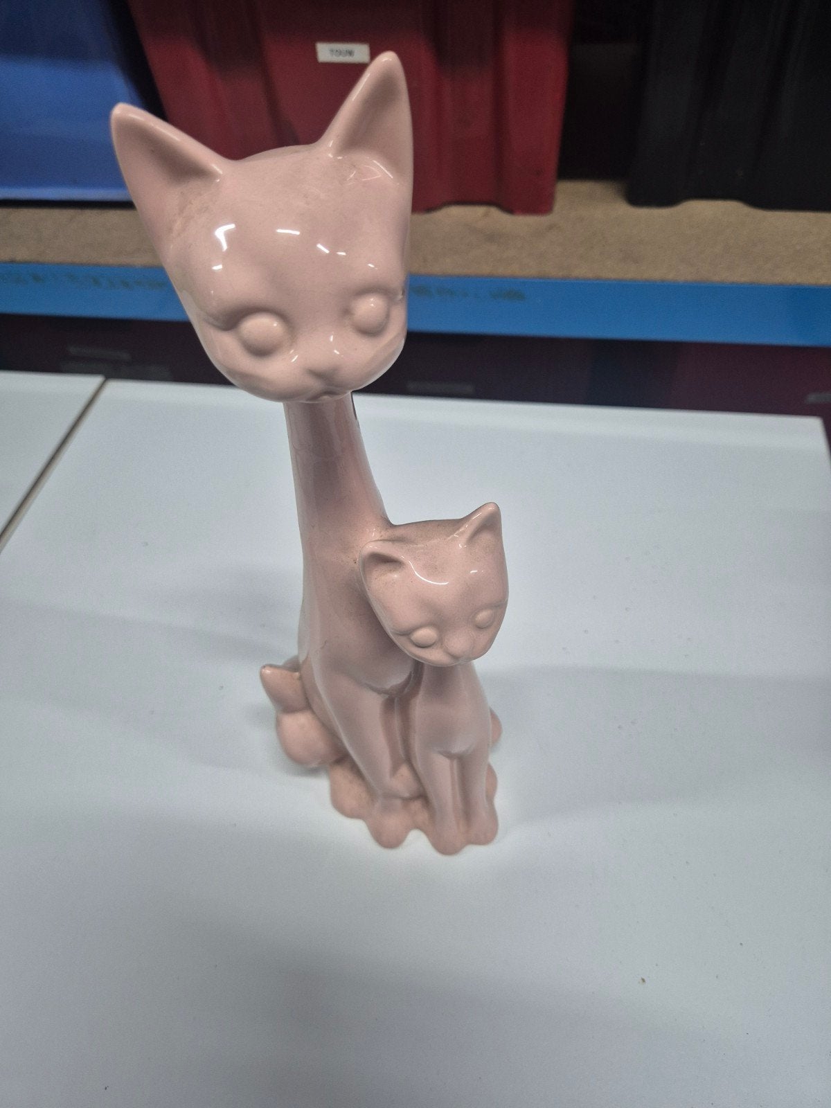 Porseleinen poes, Ophalen