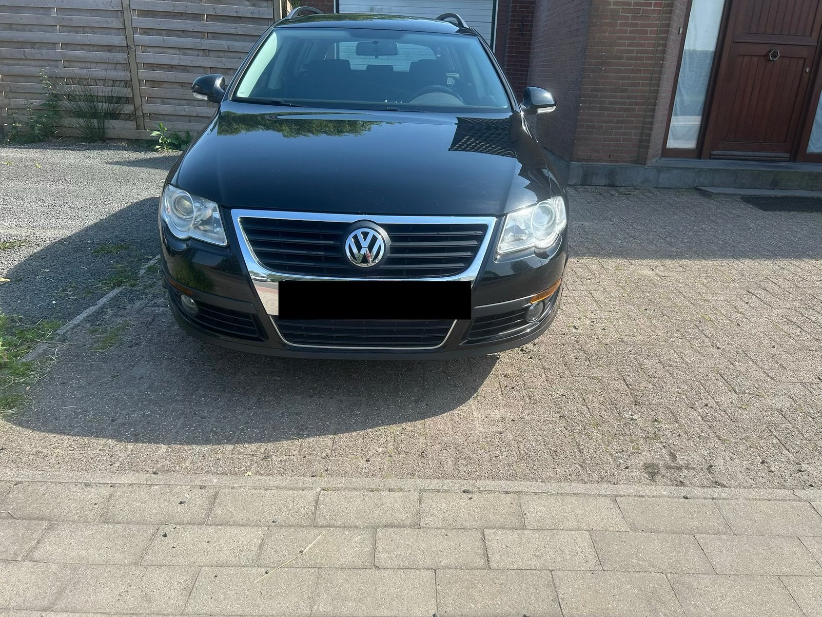 VW Passat benzine 2010, Auto's, 90 kW, Euro 5, Stof, Zwart