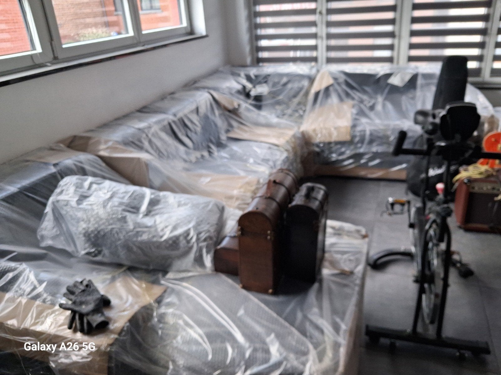 Grote zwarte leren hoekbank, Huis en Inrichting