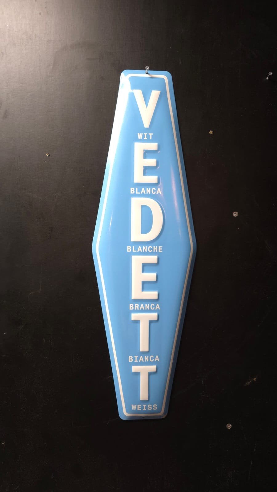Panneau publicitaire en métal blanc Vedett 65 x 20 cm — déco, Enlèvement, Panneau publicitaire