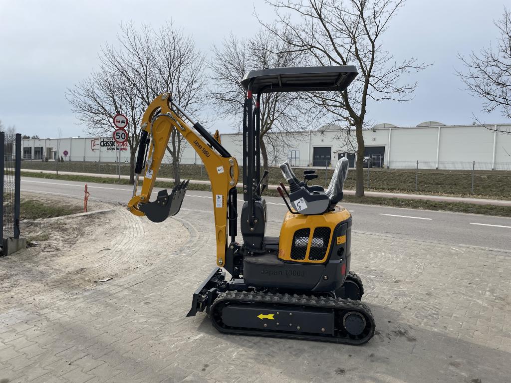 Beschrijving  Graafmachines GT JAPAN 1000 J, Zakelijke goederen, Machines en Bouw | Kranen en Graafmachines, Ophalen, Graafmachine