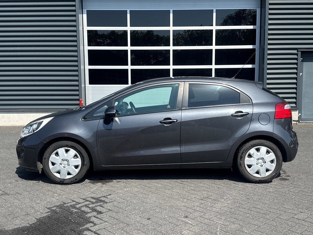 Kia Rio 1.2 CVVT Super Pack | airco | cruise control | PDC, Autos, 63 kW, Entreprise, 5 places, Alarme