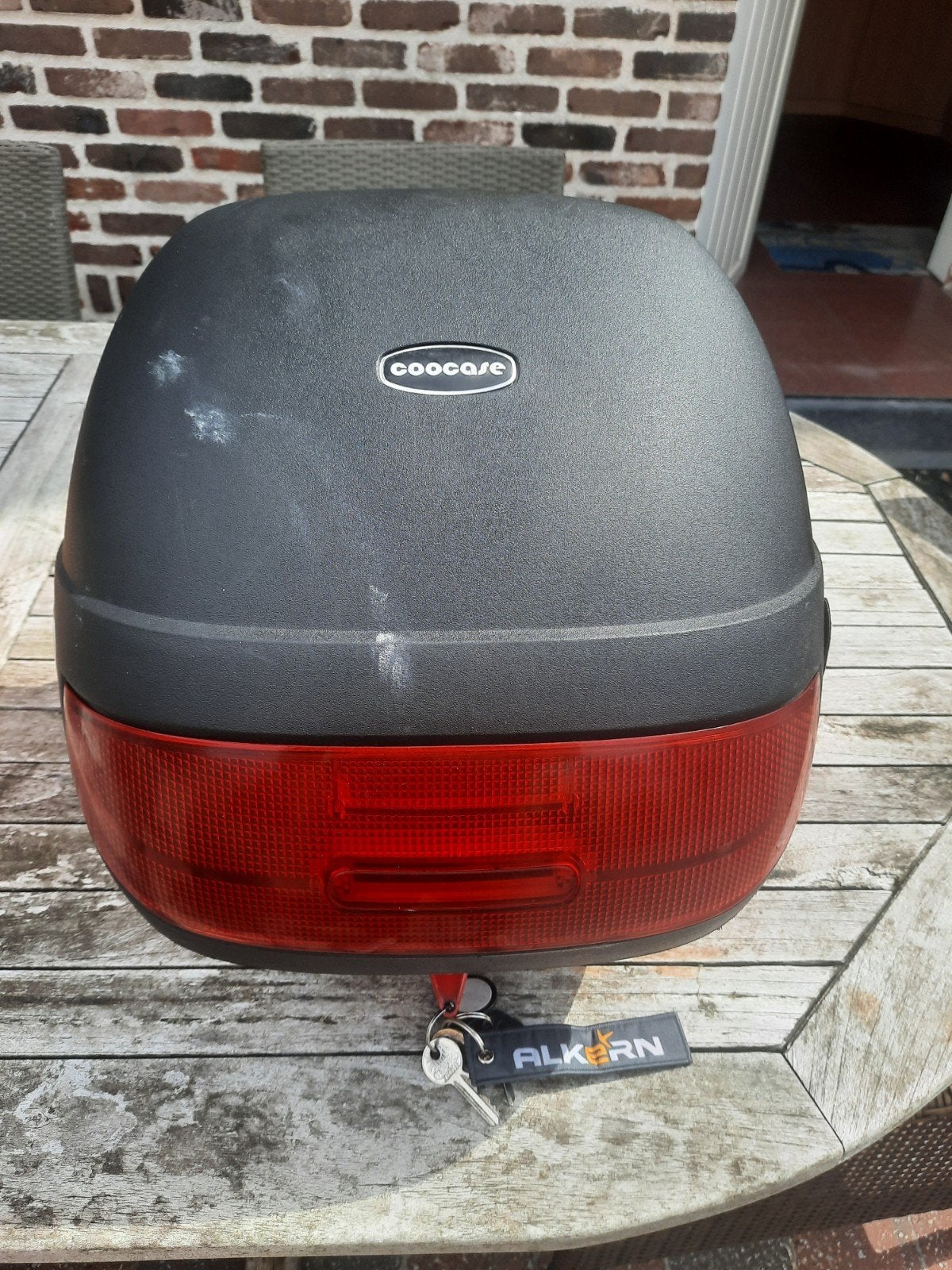 Topkoffer voor scooter, Ophalen