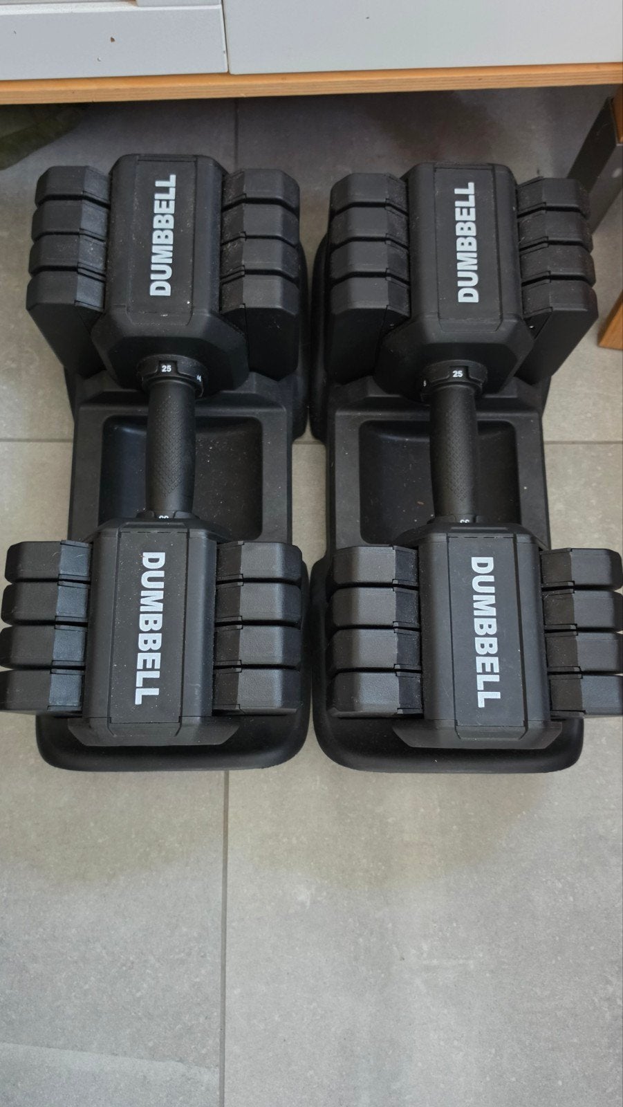 Regelbare dumbells, Ophalen
