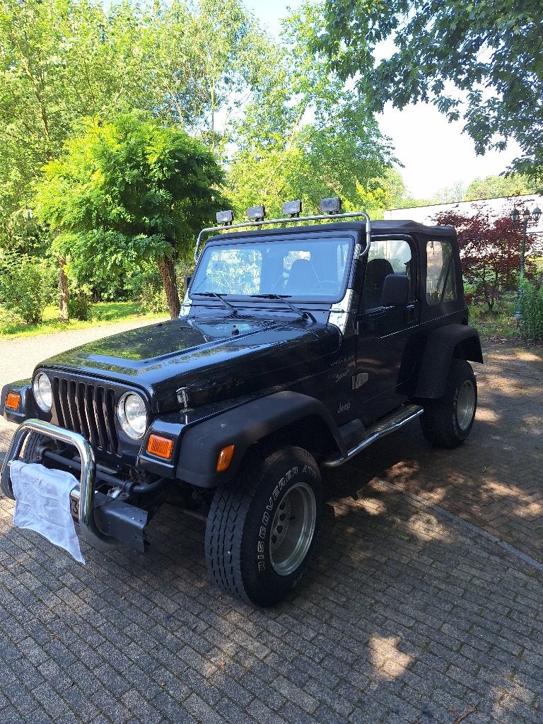 te koop Jeep Wrangler, Auto's, Jeep, Open dak, Stof, 87 kW, Zwart