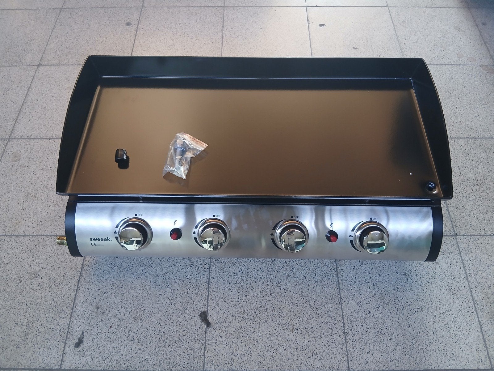 Gas grill plaat, Ophalen