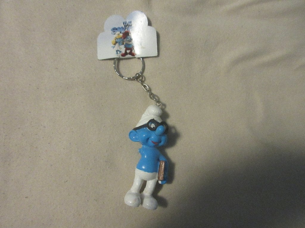 brilsmurf/leeuw van bellewaarde, Verzamelen, Sleutelhangers, Ophalen of Verzenden, Zo goed als nieuw