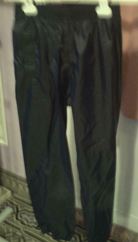 Regenbroek, Ophalen of Verzenden, Zo goed als nieuw, Quechua, Jongen of Meisje
