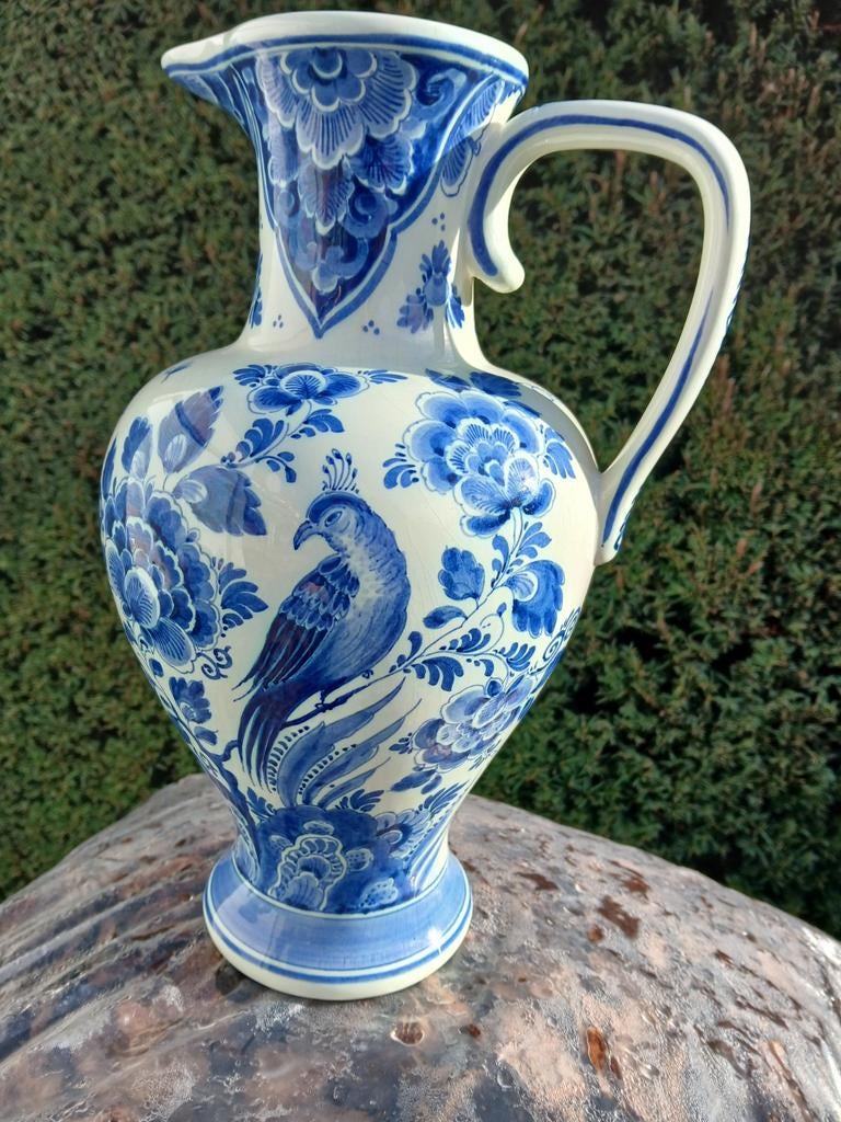 Joli pichet en bleu de Delft, Enlèvement