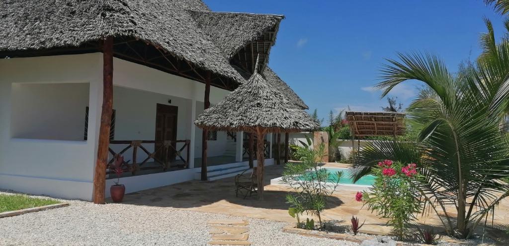 Zanzibar - Villa + Maison + Terrain a vendre, Maison d'habitation, 3 pièces, Hors Europe, Village