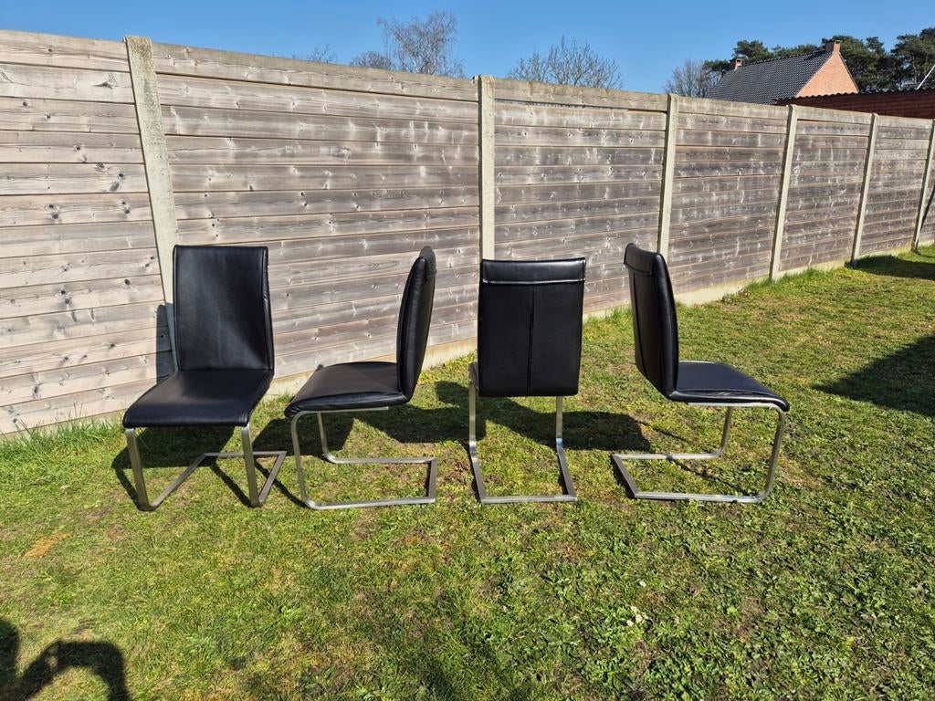 4 zwarte lederen stoelen, Enlèvement