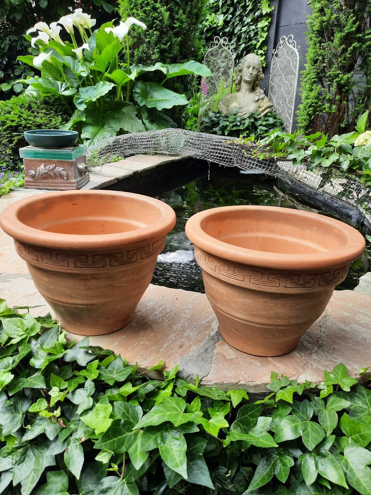 Stenen bloempotten, Tuin en Terras, Ophalen
