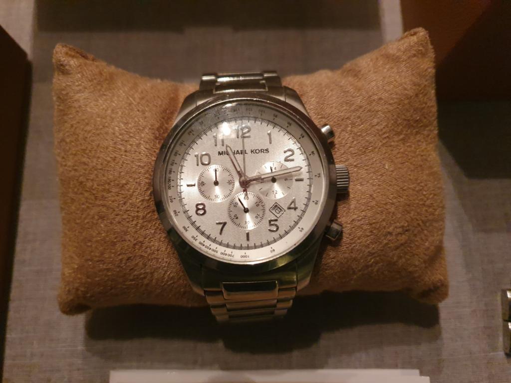 Michael Kors horloge, Ophalen