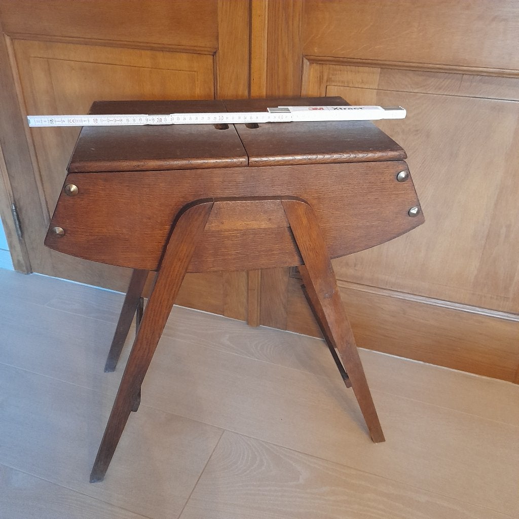 houten (naai)kastje, Ophalen
