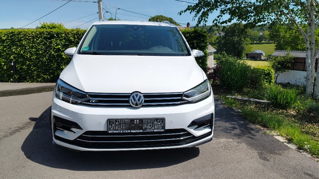 VW Touran, Autos, Achat, 110 kW, 7 places, Carnet d'entretien