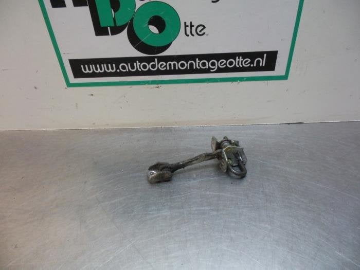 Butée 4portes arrière droite d'un Opel Corsa (Corsa C 00-), -, Opel, Utilisé, -