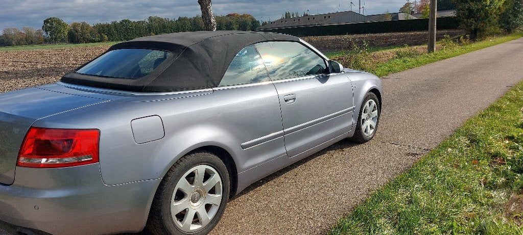 Audi A4 Cabrio 1.8 Turbo benzine, Auto's, 4 zetels, Zwart, 4 cilinders, Cabriolet