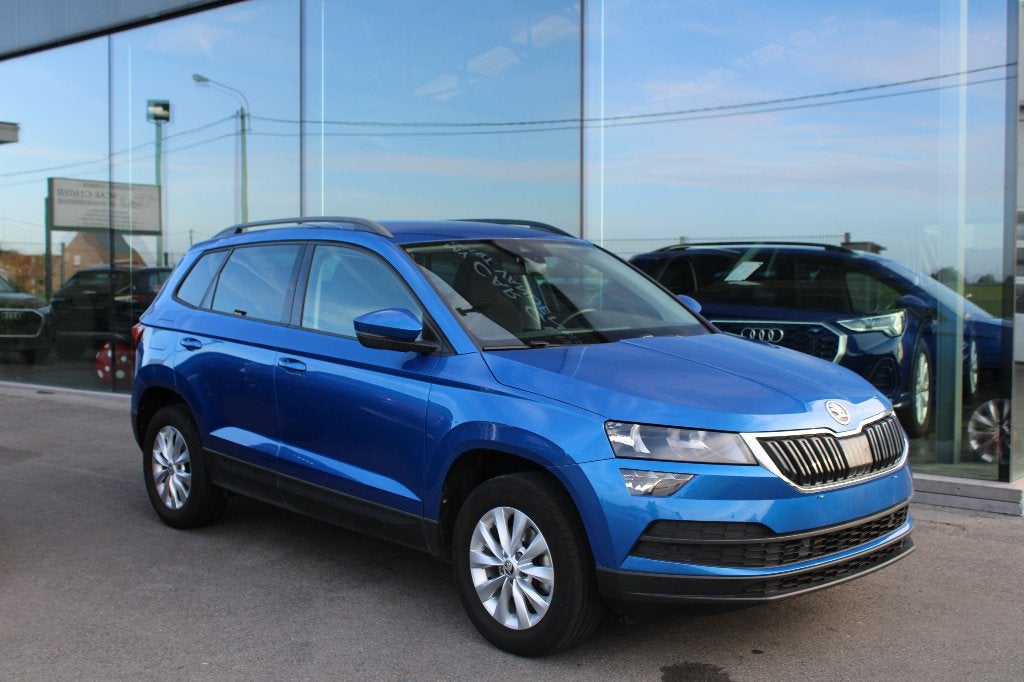 SKODA KAROQ 1.0TSI-CAMERA-TREKHAAK-AC-NAVI, Auto's, Dealer onderhouden, Stof, Euro 6, Blauw
