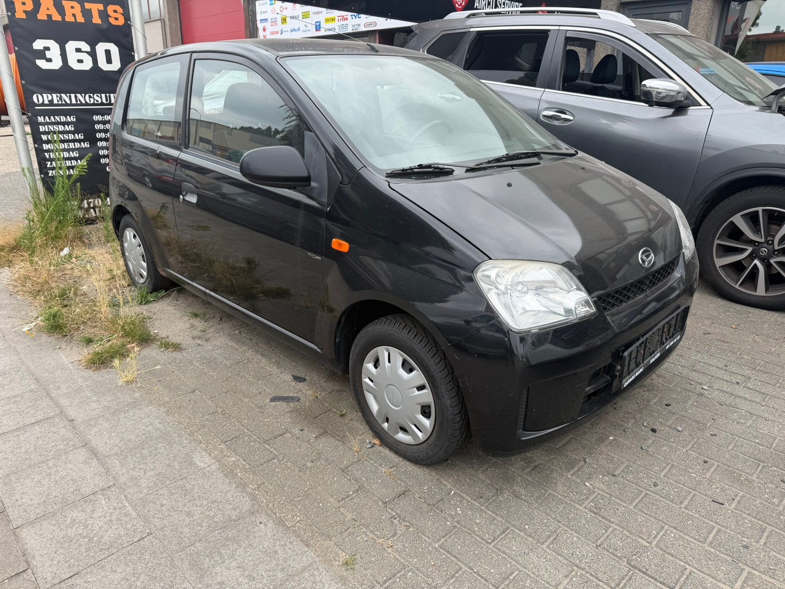 Daihatsu CUORE 1.1 benzine 2004 in perfecte staat, Auto's, Stof, Zwart, Cuore, Zwart
