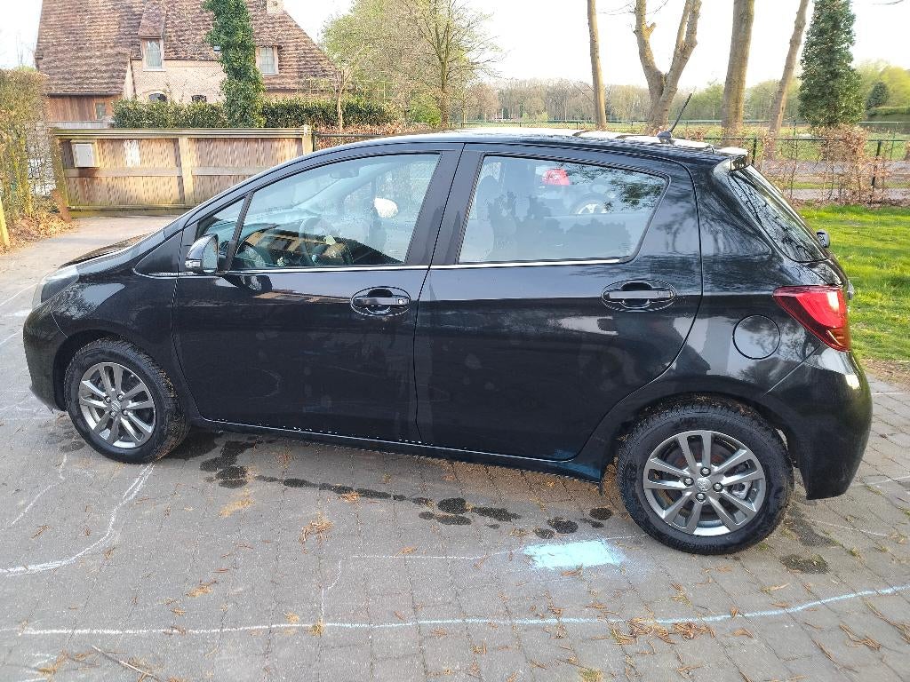 Toyota Yaris 1.33 VVTi 54333km (bj 2015) 1 jaar garantie !!!, Voorwielaandrijving, Euro 5, Stof, Zwart