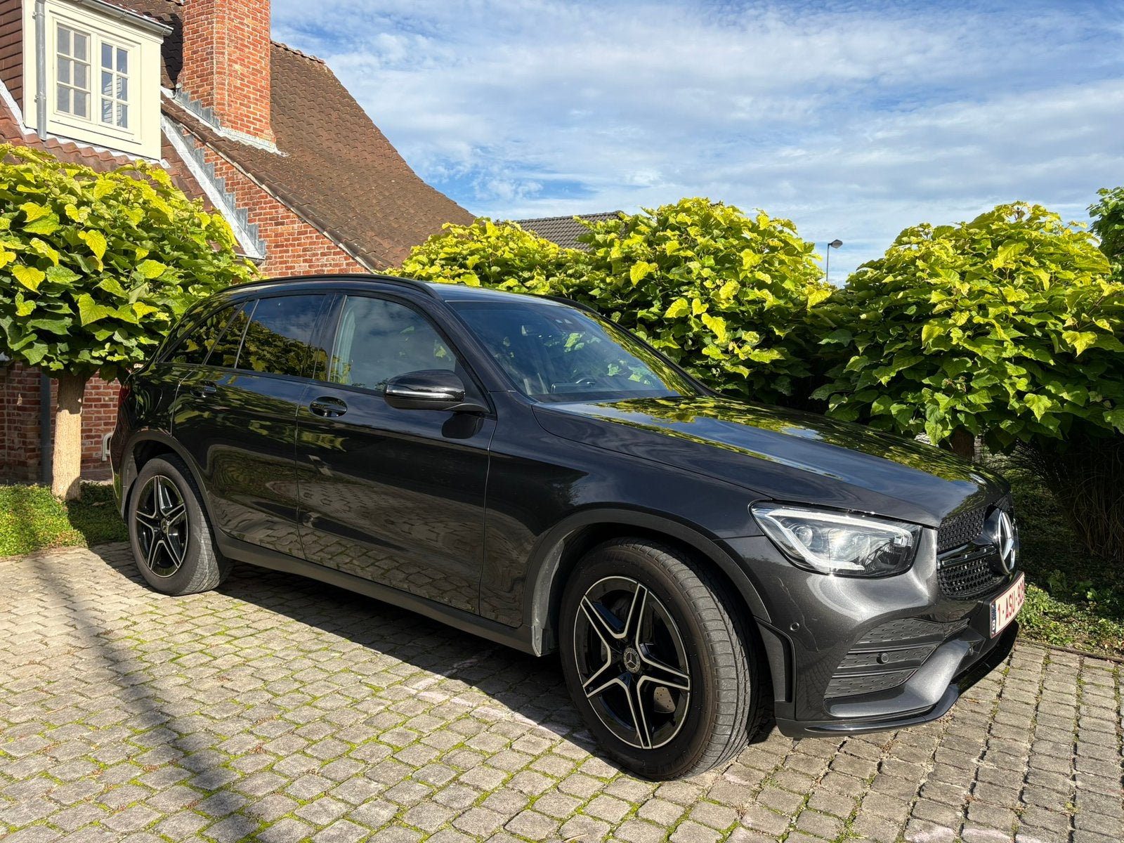 Mercedes-Benz GLC 200 4MATIC AMG Line, Auto's, Automaat, Dealer onderhouden, Zwart, Navigatiesysteem